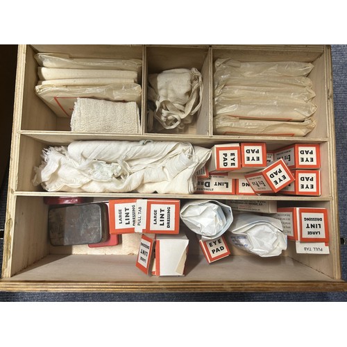 589 - A vintage first aid kit and contents, assorted silver plate cutlery and flatware, and other items (q... 