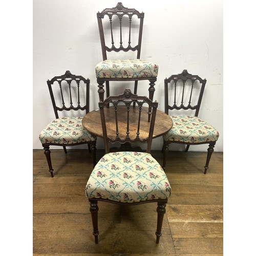 645 - A set of four 19th century walnut dining chairs, and an oak wine table, 78 cm diameter (5)