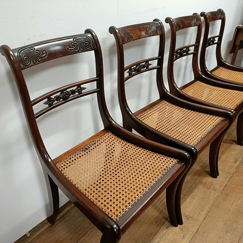 632 - A set of four Regency style bar back dining chairs, with carved top rails (4)