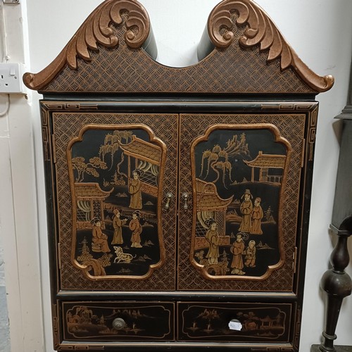 630 - A lacquered cabinet, in the Chinese manner, 70 cm wide, two boxes and two Eastern carvings (5)