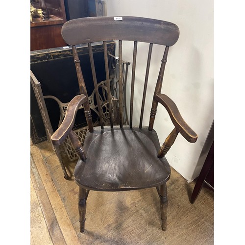 651 - A cast iron Singer sewing machine base, a Windsor chair, a bamboo table, and assorted other furnitur... 