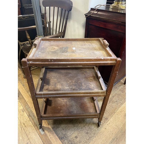 651 - A cast iron Singer sewing machine base, a Windsor chair, a bamboo table, and assorted other furnitur... 