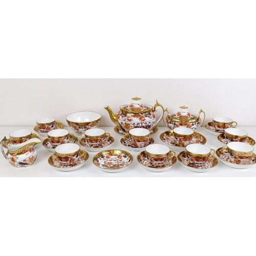 519 - An early 19th century Spode 967 pattern tea service, deorated in an Imari pallet