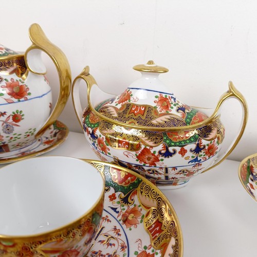 519 - An early 19th century Spode 967 pattern tea service, deorated in an Imari pallet