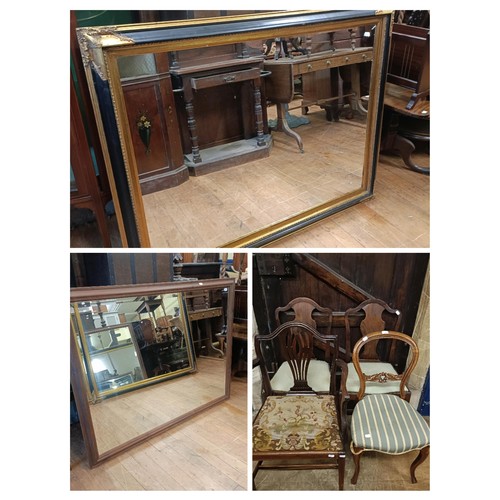 770 - A wall mirror, with a gilt and painted black frame, 110 x 143 cm, a pine wall mirror, 105 x 140 cm, ... 