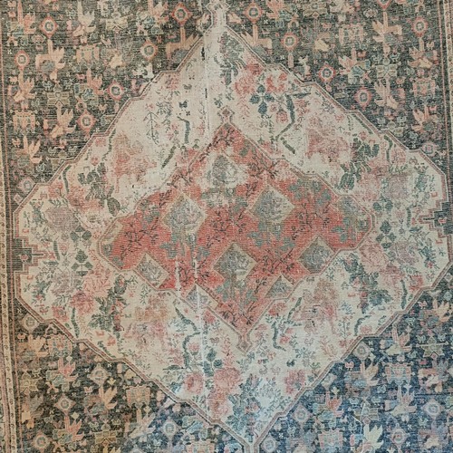 628 - A Persian blue ground rug, 220 x 130 cm