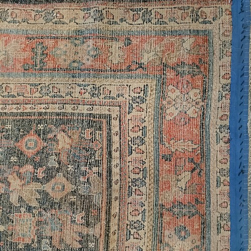 628 - A Persian blue ground rug, 220 x 130 cm