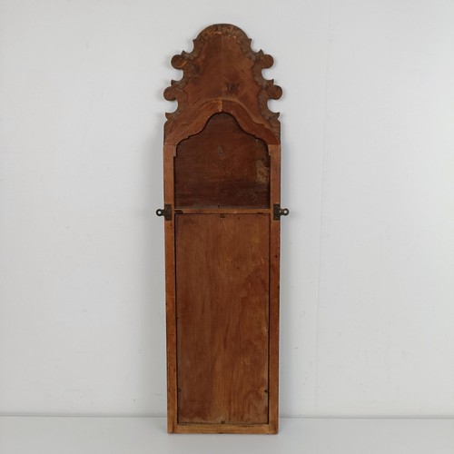 629 - A Georgian style mahogany fret frame mirror, painted flowers, 80 x 23 cm