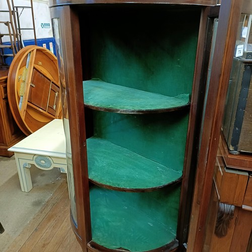 774 - An Edwardian mahogany bow front display cabinet, 77 cm wide