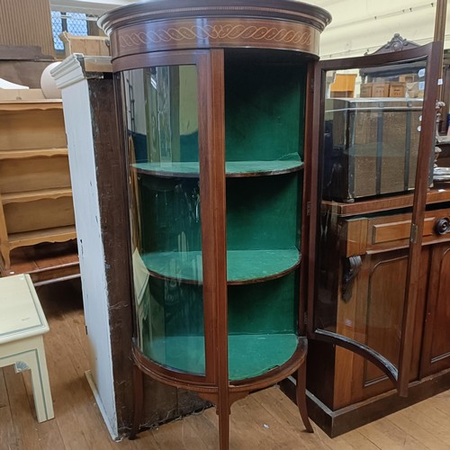 774 - An Edwardian mahogany bow front display cabinet, 77 cm wide