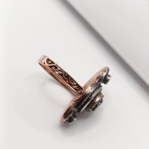 32 - A certificated Georgian style 8ct rose gold (silver top) elongated cluster ring set, with natural ba... 