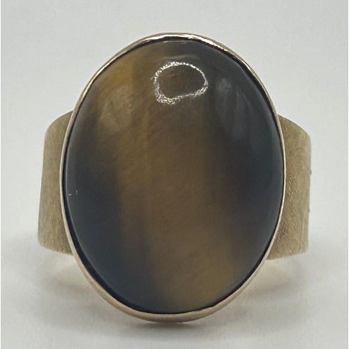 43 - A 9ct gold and tigers eye ring, ring size H