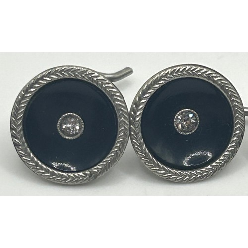 44 - A set of four platinum, enamel and white stone dress buttons