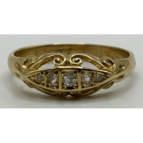 53 - An 18ct gold and three stone diamond ring, ring size Q, in a vintage jewellery box