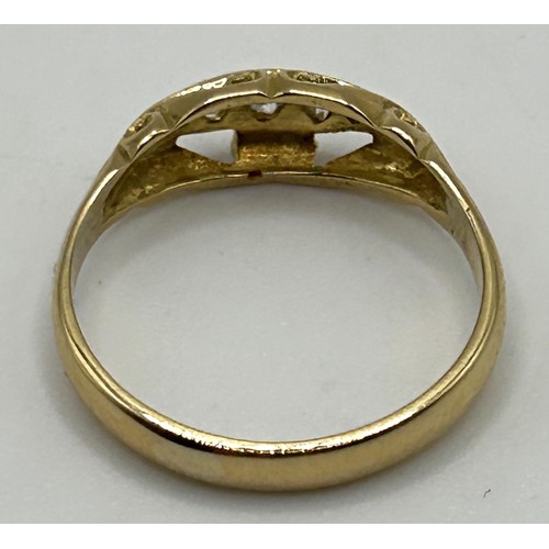 53 - An 18ct gold and three stone diamond ring, ring size Q, in a vintage jewellery box