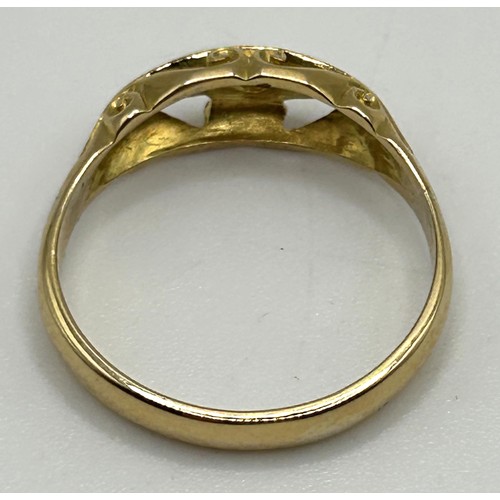 53 - An 18ct gold and three stone diamond ring, ring size Q, in a vintage jewellery box