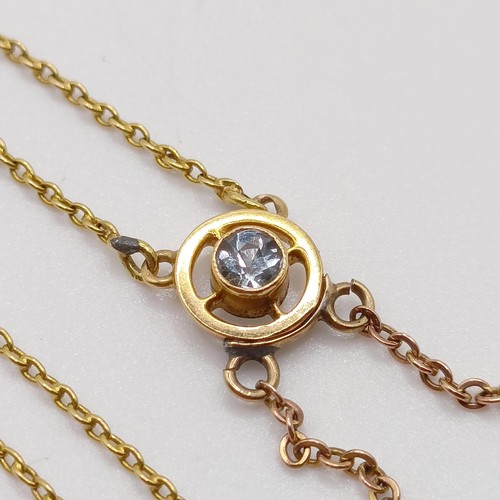 64 - A 15ct gold gem set pendant, on a chain