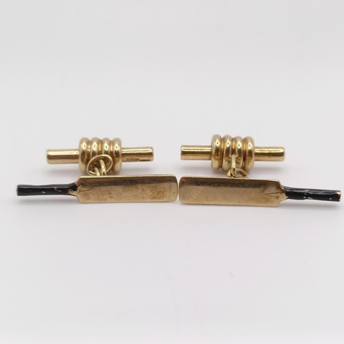 69 - A pair of 9ct gold and enamel novelty cufflinks, in the form of cricket bats and bails