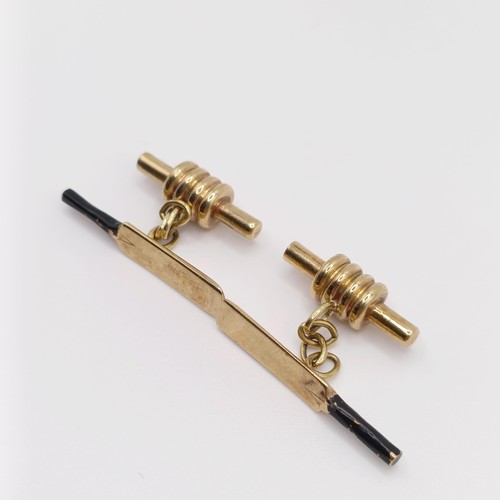 69 - A pair of 9ct gold and enamel novelty cufflinks, in the form of cricket bats and bails