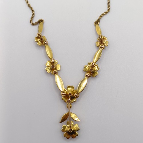 75 - An early 20th century 15ct gold and seed pearl floral necklace