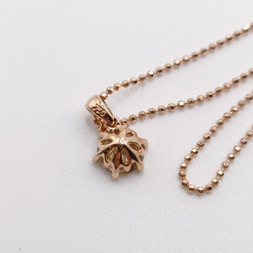 77 - A certificated 18ct rose gold and RBC diamond solitaire pendant, on a rose gold-plated silver chain,... 