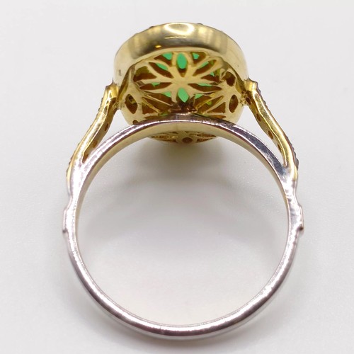 101 - A dress ring set with a central chrysoprase and rose-cut diamonds in silver gilt, oval cabochon chry... 