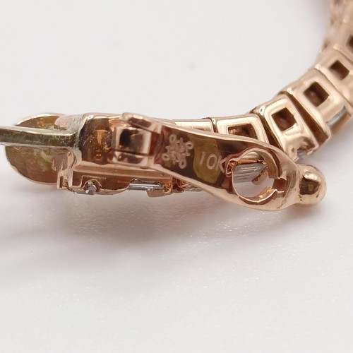 107 - An unusual 10ct rose gold bracelet, set with baguette and RBC diamonds, with an open box clasp and s... 