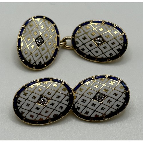 111 - A pair of 18ct gold, enamel and diamond set cufflinks, of oval form, having chain connectors, 11 g (... 