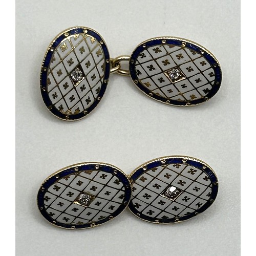 111 - A pair of 18ct gold, enamel and diamond set cufflinks, of oval form, having chain connectors, 11 g (... 