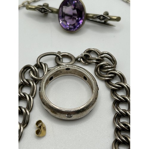 145 - A silver identity bracelet and assorted other jewellery