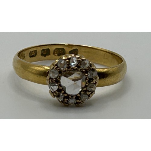 152 - A 22ct gold and diamond cluster ring, with a central old cut heart shaped diamond, ring size K, in a... 