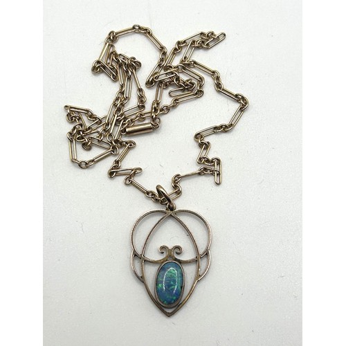 160 - An Art Nouveau 9ct gold and opal pendant, on a 9ct gold fancy chain