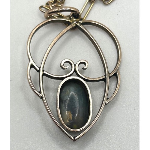 160 - An Art Nouveau 9ct gold and opal pendant, on a 9ct gold fancy chain