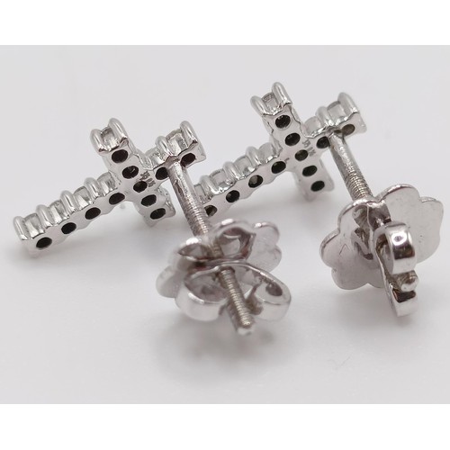 163 - A pair of 9ct white gold and diamond cross screw-back earrings, boxed, R/C diamonds 0.26ct