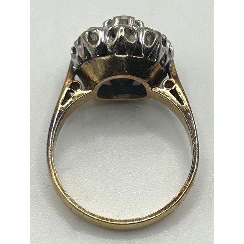 167 - An 18ct gold and diamond cluster ring, ring size K