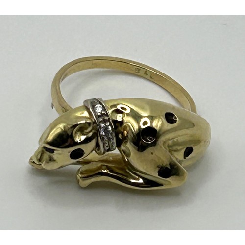 174 - An 18ct gold and gem set leopard ring, ring size M, 8.1 g all in