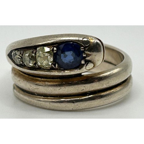 200 - A white coloured metal, diamond and sapphire serpent ring, ring size R, in a vintage jewellery box