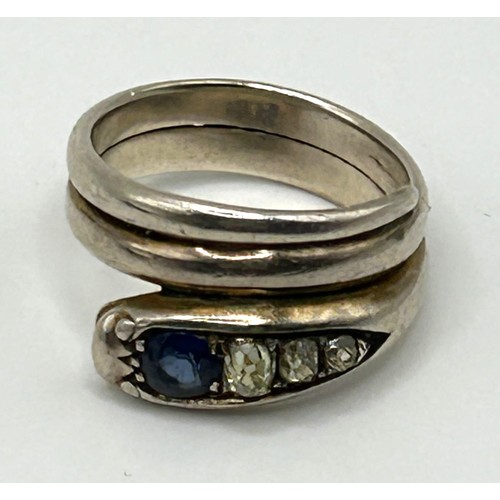 200 - A white coloured metal, diamond and sapphire serpent ring, ring size R, in a vintage jewellery box