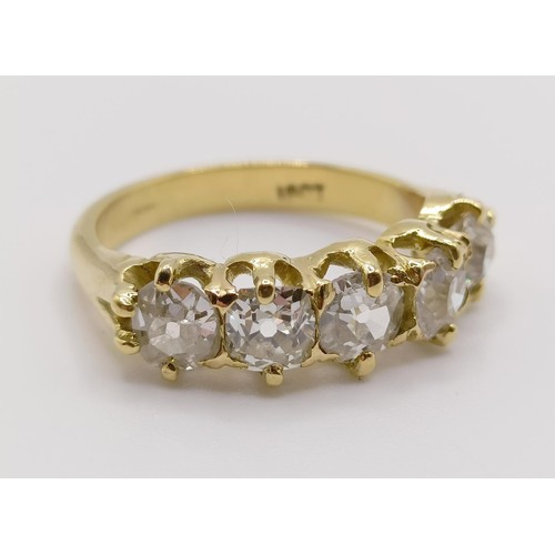 207 - An 18ct gold and five stone diamond half hoop ring, ring size J