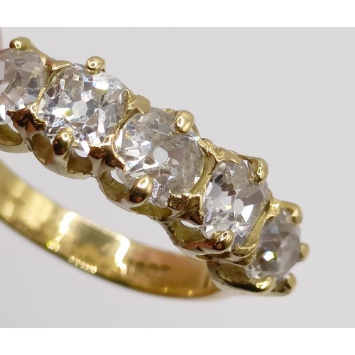 207 - An 18ct gold and five stone diamond half hoop ring, ring size J