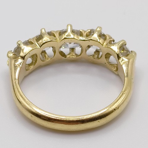 207 - An 18ct gold and five stone diamond half hoop ring, ring size J