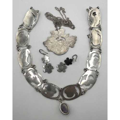 214 - A silver and enamel necklace, decorated flowers, and matching earrings, and  a pendant  on chain, al... 