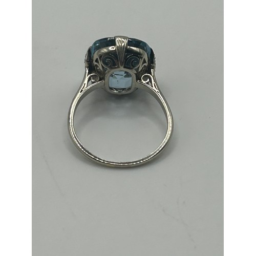 19 - An 18ct white gold and aquamarine ring, ring size M, in a vintage jewellery box