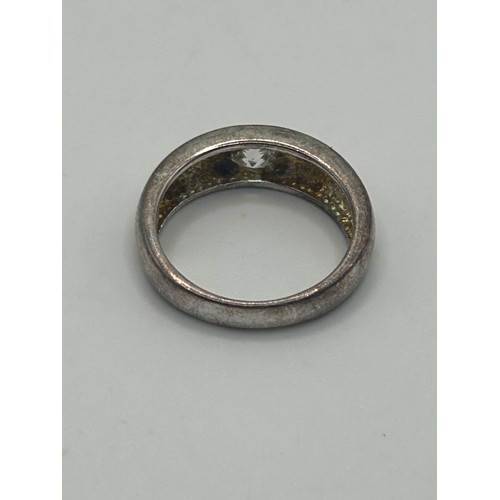 2 - ***Withdrawn*** A silver coloured metal and diamond gypsy set ring, ring size L