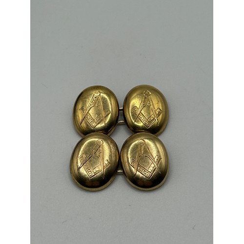 34 - A pair of George V 15ct gold Masonic cufflinks, Birmingham 1925, 8.2 g, in a modern jewellery box