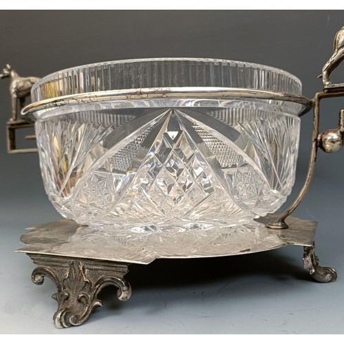 351 - A silver plated and cut glass trophy bowl, with greyhound handles, 37 cm wide