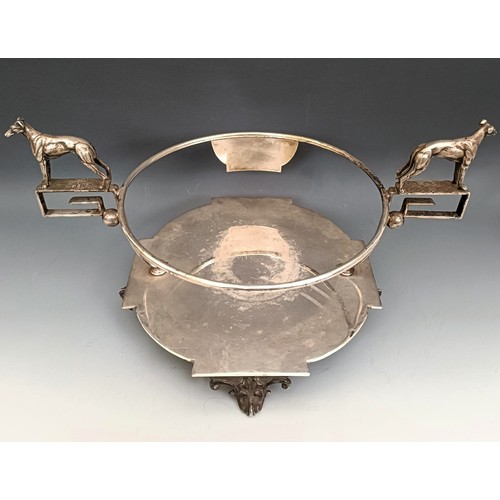 351 - A silver plated and cut glass trophy bowl, with greyhound handles, 37 cm wide