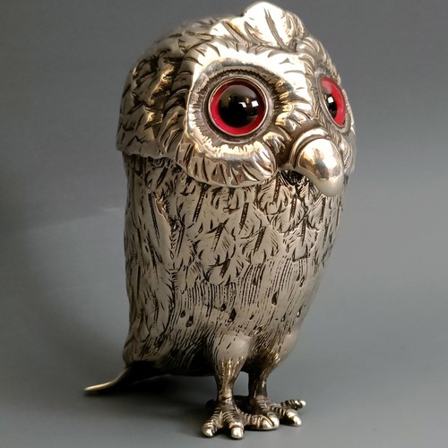 358 - A silver coloured metal novelty mustard, in the form of an owl, with glass eyes, 9 cm high