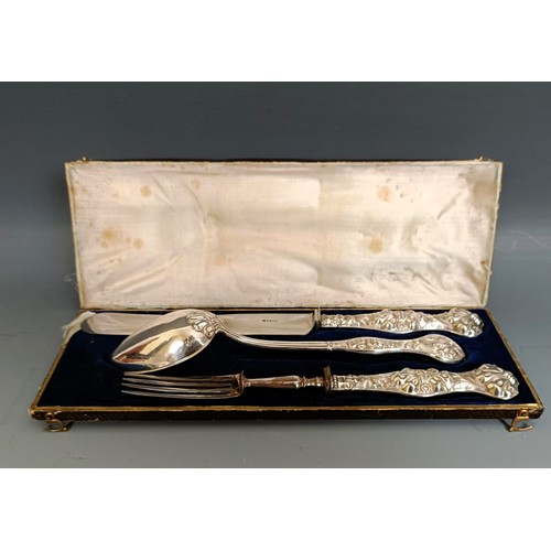 368 - A Continental silver christening set, comprising a knife, fork and spoon, cased, case decorated with... 