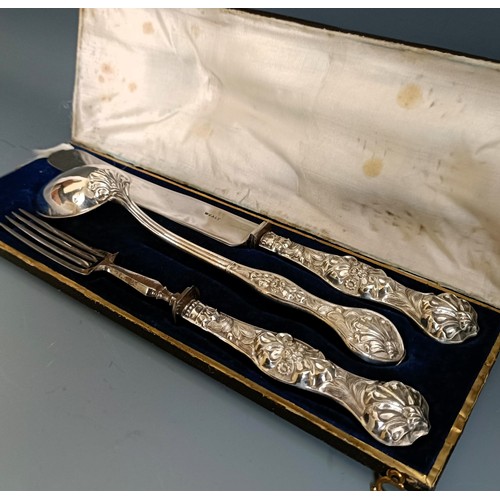 368 - A Continental silver christening set, comprising a knife, fork and spoon, cased, case decorated with... 